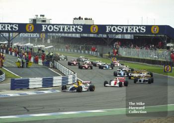 Damon Hill, Williams Renault FW15C, leads from Ayrton Senna, McLaren MP4-8, at Copse Corner, Silverstone, British Grand Prix 1993.
