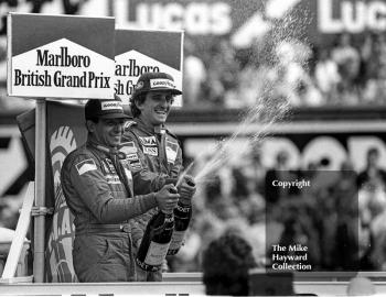 Winner Alain Prost and second-placed Michele Alboreto on the podium, British Grand Prix, Silverstone, 1985
