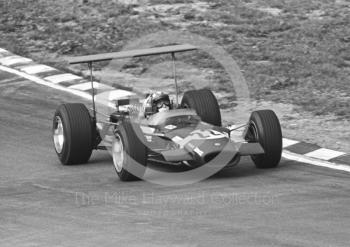 Race winner Jo Siffert, Rob Walker Lotus Cosworth V8 49B R7, at Paddock Bend, British Grand Prix, Brands Hatch, 1968.
