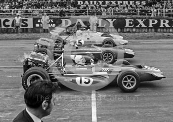 Chris Amon, works March Ford 701; Jackie Stewart, Tyrrell March Ford 701; Denny Hulme, McLaren Ford M14A; and Peter Gethin, Sid Taylor McLaren M10B Chevrolet; Silverstone International Trophy 1970.
