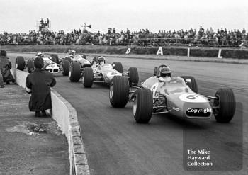 Bev Bond, Race Cars International Brabham BT28; Alan Rollinson, Goodwin Racing Chevron B15; Tetsu Ikuzawa, Mike Spence Lotus 59; and Reine Wisell, Chevron B15, Silverstone, British Grand Prix meeting 1969.
