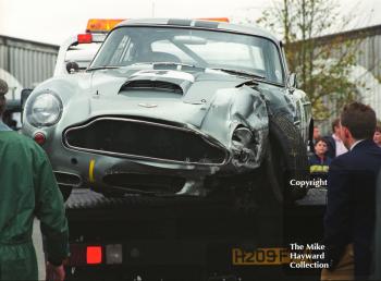 Crumpled Aston Martin DB4GT of Hubert Fabri and Mark Knopfler, RAC TT, Goodwood Revival, 1999.
