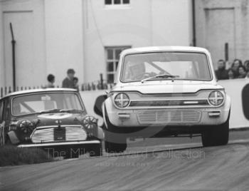 Peter Baldwin, Morris Mini Cooper S, follows a Sunbeam Imp through Lodge Corner, Oulton Park, Rothmans International Trophy meeting 1971.
