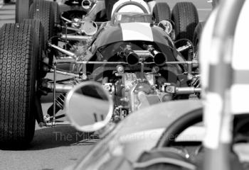 Black and white study of the Lotus 25 of Nick Fennell before the HGPCA pre-66 Grand prix cars event, Silverstone Classic 2010