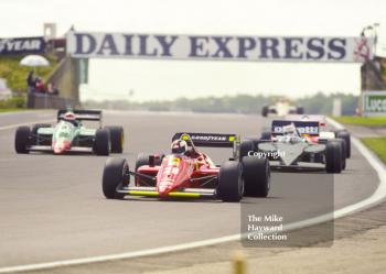 Stefan Johansson, Ferrari 156/85, leads Nelson Piquet, Brabham BT54, Silverstone, British Grand Prix, 1985.
