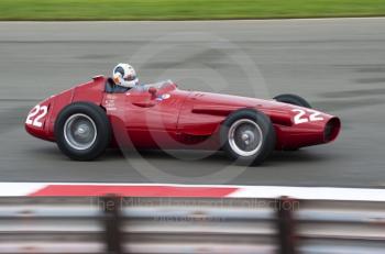 1958 Maserati 250F of Allan Miles at Woodcote Corner during the HGPCA event for front engine GP cars at 2010 Silverstone Classic