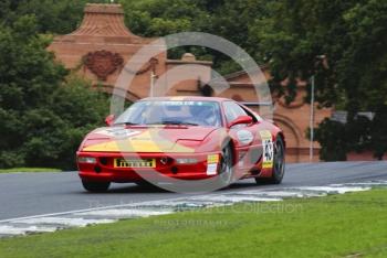 Skid Carrera driving a Ferrari F355 round Lodge Corner, Oulton Park, during the Pirelli Ferrari Maranello Challenge, August 2001.
