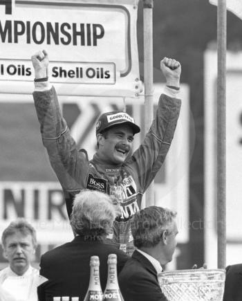 Nigel Mansell, Williams Honda, celebrates his victory at Brands Hatch, British Grand Prix 1986.
