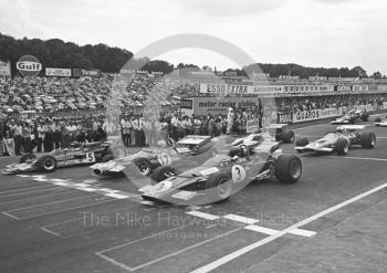 Jochen Rindt, Lotus 72C, Jack Brabham, Brabham BT33, and Jacky Ickx, Ferrari, 312B on the front row for the 1970 British Grand Prix at Brands Hatch.
