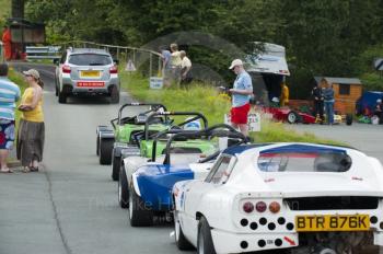 Cars queue in the paddock, Hagley and District Light Car Club meeting, Loton Park Hill Climb, August 2012. 