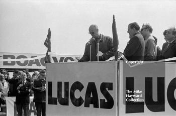 Earl Howe, BARC president, cuts the tape and officially opens the Thruxton circuit before the 1968 Formula 2 International, Easter Monday meeting.
