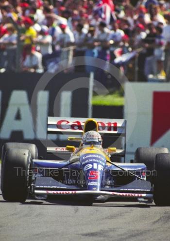 Winner Nigel Mansell, Williams FW14, British Grand Prix, Silverstone, 1991.
