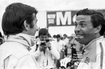 Jackie Stewart, left, shares a joke with Jim Clark at Silverstone, 1967 British Grand Prix.
