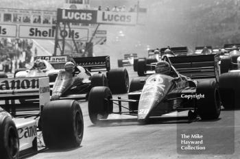 Gerhard Berger, Benetton B186, and Ayrton Senna, Lotus 98T, Brands Hatch, British Grand Prix 1986.
