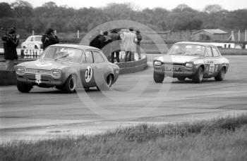 P Pearson, K McDonald Ford Escort, and Rod Mansfield, Team Diamond Ford Escort (XPU 33F), Silverstone Martini International Trophy meeting 1969.
