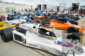 FIA Masters Historic Formula 1 cars in the paddock during the 2016 Silverstone Classic.
