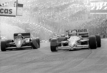 Nigel Mansell, Williams Honda FW11, and Ayrton Senna, JPS Lotus 98T, at Paddock Bend, Brands Hatch, 1986 British Grand Prix.
