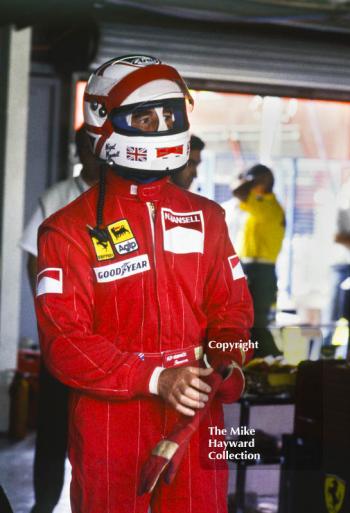 Nigel Mansell in the pits during practice for the British Grand Prix, Silverstone, 1989.
